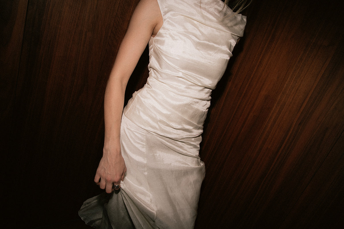 Detail view highlighting the fine horizontal ruching and layered hem of the Bella Set top.