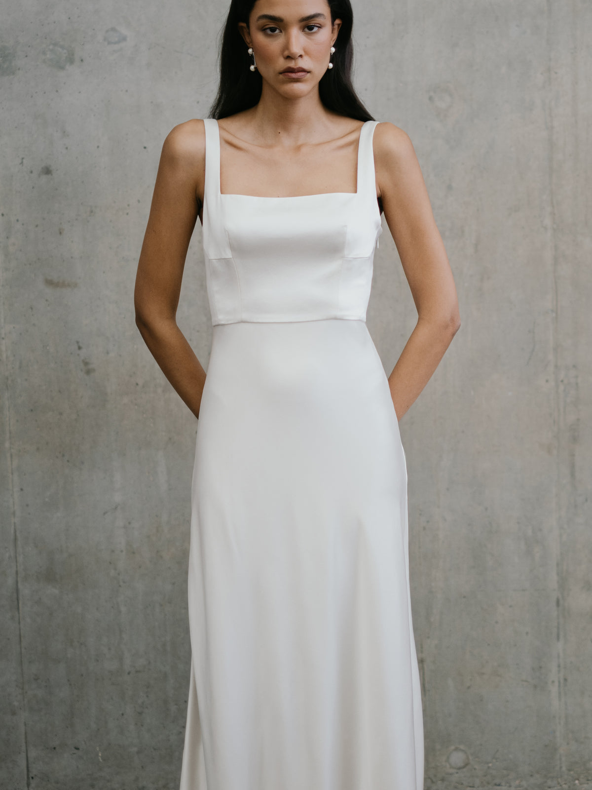 Medium front shot highlighting the fitted square-neck bodice and wide shoulder straps on the Clara gown.