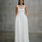 Full length front view of the Unbridled Studio Thora textured jacquard wedding gown with square neckline and hidden pockets at Carte Blanche Bride Australia.